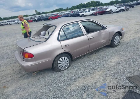 2001 Toyota Corolla Ce z USA, uszkodzony, nr VIN 1NXBR12E31Z545323